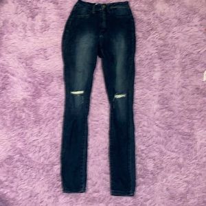 skinny ripped jeans rips on the front and back